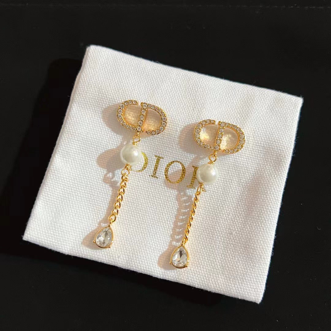 Pendientes Dio crystal en tono dorado