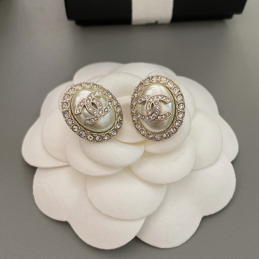 Cc egg earrings