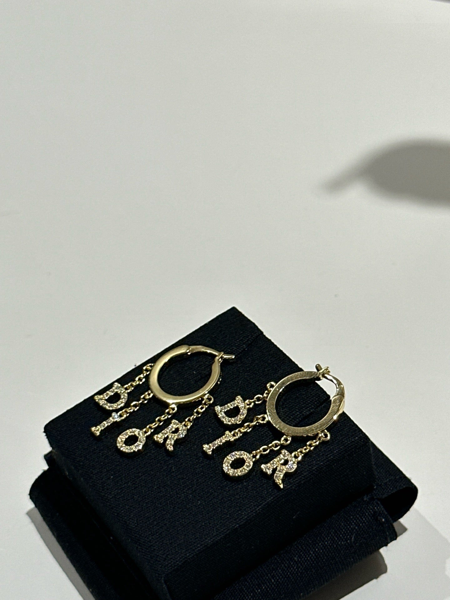 Dio logo hoop earrings