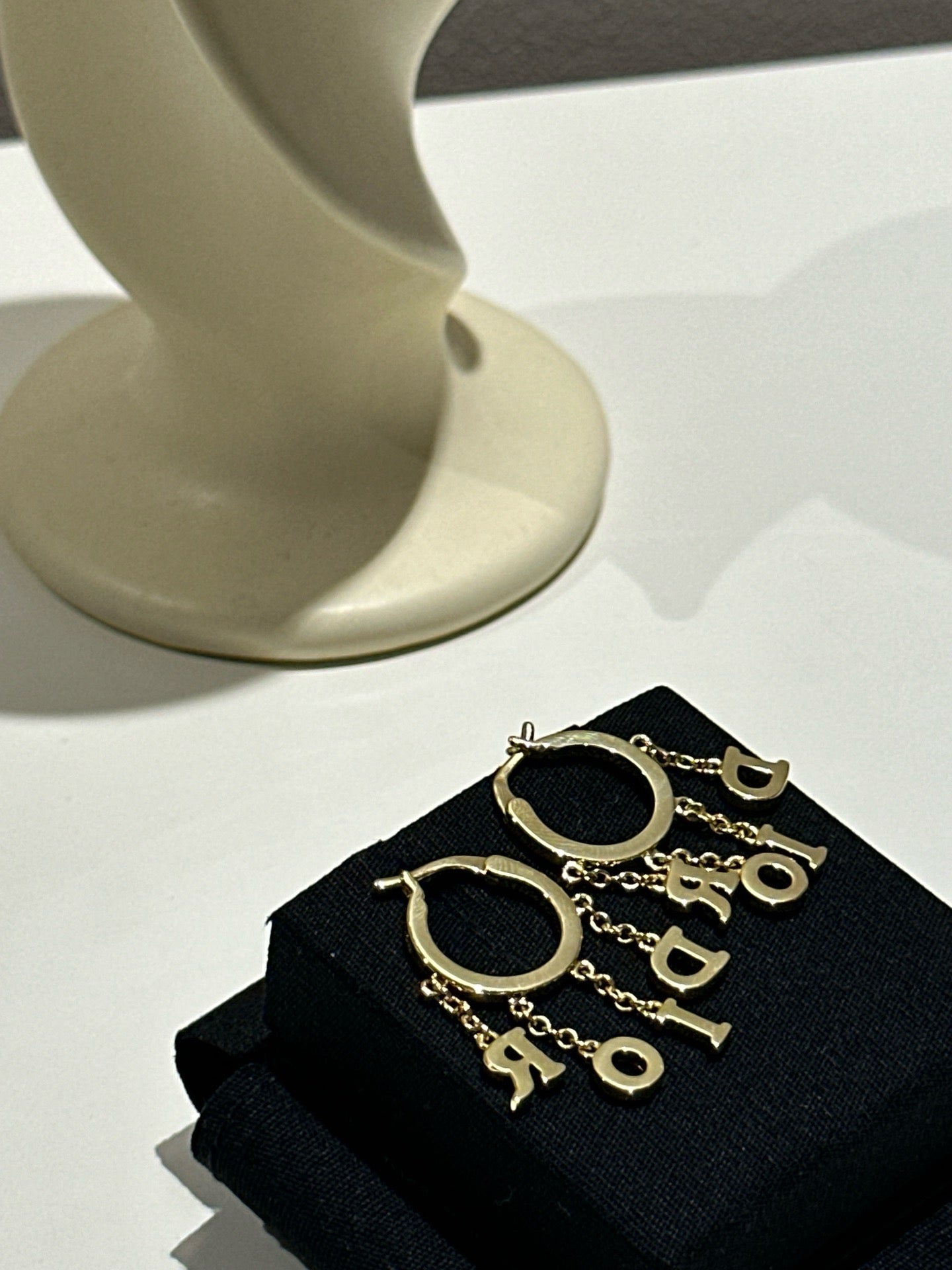 Dio logo hoop earrings