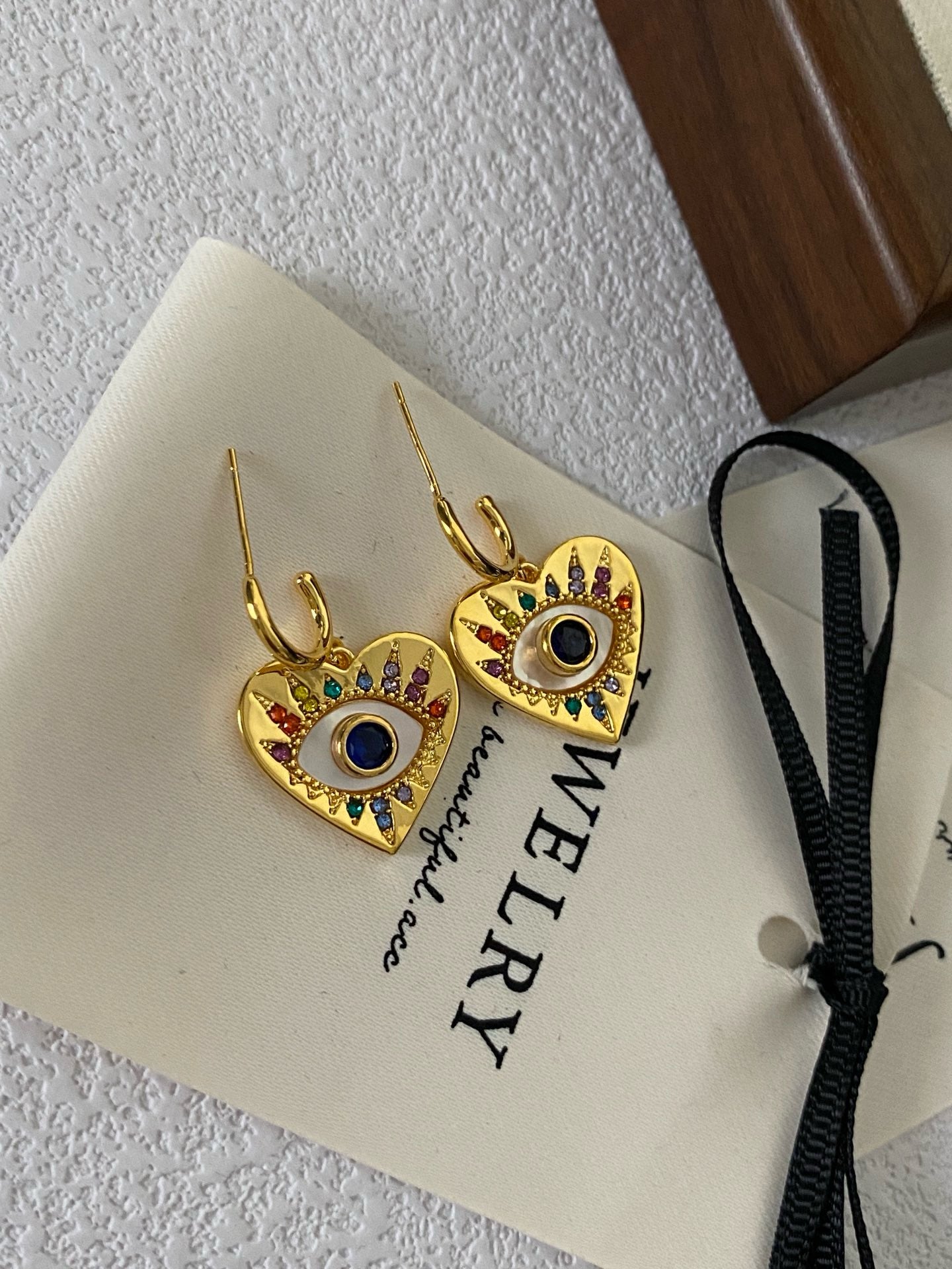 Heart eye earrings